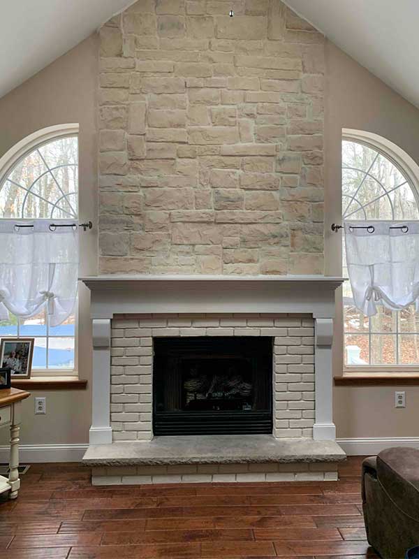 Fireplace in Living Room with Large Windows - Lackawanna County PA - Integrity Chimney Service
