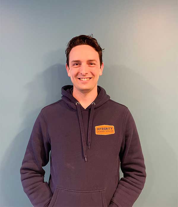 Integrity Chimney - Aric Waddell owner nice smile - wearing a hoodie with the company logo