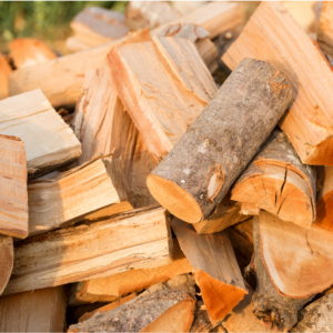 a pile of cut up wood for burning