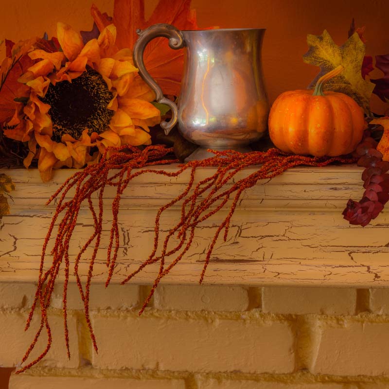 Mantelpiece decorated for fall